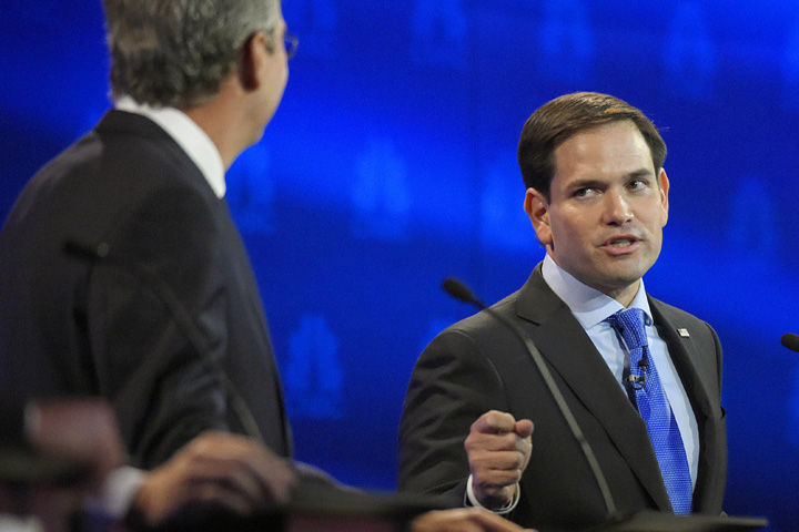 Marco Rubio, right, and Jeb Bush, argue a point during the CNBC Republican presidential debate at the University of Colorado, Wednesday, Oct. 28, 2015, in Boulder, Colo. (AP Photo/Mark J. Terrill)